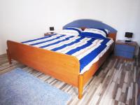 Postel nebo postele na pokoji v ubytování Apartment Gobov