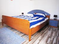 Postel nebo postele na pokoji v ubytování Apartment Gobov