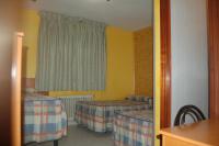 Postel nebo postele na pokoji v ubytování Hostal Mays