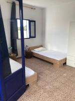 A bed or beds in a room at Casa Carpe Diem