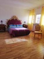 A bed or beds in a room at One M