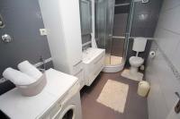 Kúpeľňa v ubytovaní APARTMANI IVONA & IVO