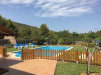 The swimming pool at or close to Casa Neus Barà