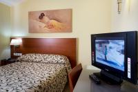 Postel nebo postele na pokoji v ubytování Hotel Marivella