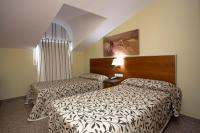 Postel nebo postele na pokoji v ubytování Hotel Marivella