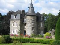 an old stone house with a turret at Chambres d&#39;hôtes Manoir Ker-Huella in Morlaix