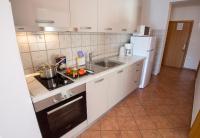 Kuchyň nebo kuchyňský kout v ubytování Apartments Villa Dorida