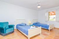 Łóżko lub łóżka w pokoju w obiekcie Can Salas