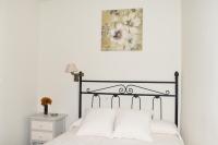 Cama o camas de una habitación en Apartamentos Vista Veleta