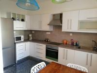 Kuchyň nebo kuchyňský kout v ubytování Asimelia Luxury Apartment