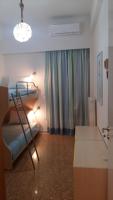 Postel nebo postele na pokoji v ubytování Asimelia Luxury Apartment