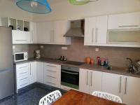 Kuchyň nebo kuchyňský kout v ubytování Asimelia Luxury Apartment