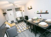 Posezení v ubytování Malone Place Apartment
