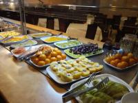 a buffet with many different types of food on a table at Romantik Spa Hotel in Yaremche