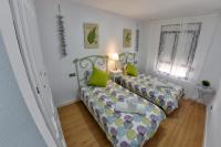 Posteľ alebo postele v izbe v ubytovaní WonderStays Apartamento Boqueron