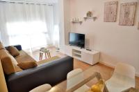 Televízia a/alebo spoločenská miestnosť v ubytovaní WonderStays Apartamento Boqueron