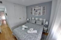 Posteľ alebo postele v izbe v ubytovaní WonderStays Apartamento Boqueron