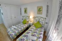 Posteľ alebo postele v izbe v ubytovaní WonderStays Apartamento Boqueron