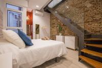 Posteľ alebo postele v izbe v ubytovaní Living4Malaga Skyline Apartments