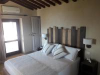 Postel nebo postele na pokoji v ubytování Agriturismo Galenzana