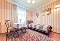 Posteľ alebo postele v izbe v ubytovaní Apartamenty Retro
