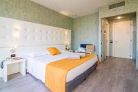 Łóżko lub łóżka w pokoju w obiekcie Hotel Viest