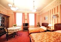 Posteľ alebo postele v izbe v ubytovaní Apartamenty Retro