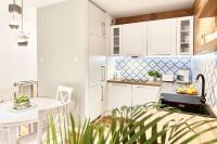 Kuchyňa alebo kuchynka v ubytovaní Mojito Apartments - Botanica II