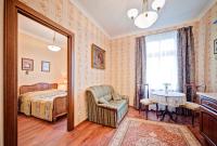 Posteľ alebo postele v izbe v ubytovaní Apartamenty Retro