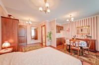 Posteľ alebo postele v izbe v ubytovaní Apartamenty Retro