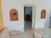 A seating area at Appartamenti Budoni