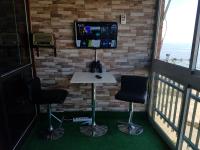 TV a/nebo společenská místnost v ubytování Apartamentos Santabarbara