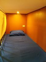 Postel nebo postele na pokoji v ubytování Grace hostel - Chiang Rai