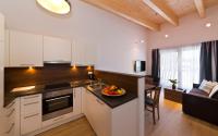Kuchyňa alebo kuchynka v ubytovaní Apartments Dolomit-Royal