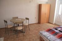 A bed or beds in a room at Penzion Atlas