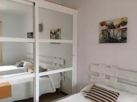 A bed or beds in a room at Viviendas Los Olivos - Formentera Break