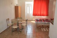 A bed or beds in a room at Penzion Atlas