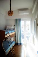 Postel nebo postele na pokoji v ubytování Asimelia Luxury Apartment