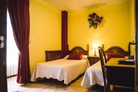 A bed or beds in a room at Posada Marina