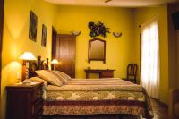 A bed or beds in a room at Posada Marina
