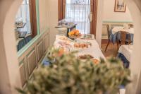 Łóżko lub łóżka w pokoju w obiekcie Hotel Terranova