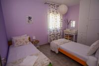 Postel nebo postele na pokoji v ubytování Rosie’s herb house