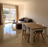 Posedenie v ubytovaní Apartamentos Las Palmeras