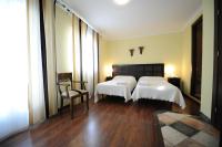 Posteľ alebo postele v izbe v ubytovaní Hotel Montearoma