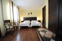 Posteľ alebo postele v izbe v ubytovaní Hotel Montearoma