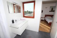 Postel nebo postele na pokoji v ubytování Rooms and Apartment Luana