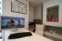 Televízia a/alebo spoločenská miestnosť v ubytovaní Hotel Kim