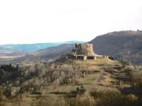 an old castle on top of a hill at le monne (dit la fermette ) in Chambon-sur-Lac
