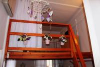 Poschodová posteľ alebo postele v izbe v ubytovaní Belvárosi Vintage Apartman a sétálóutcán
