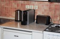 Kuchyňa alebo kuchynka v ubytovaní Belvárosi Vintage Apartman a sétálóutcán